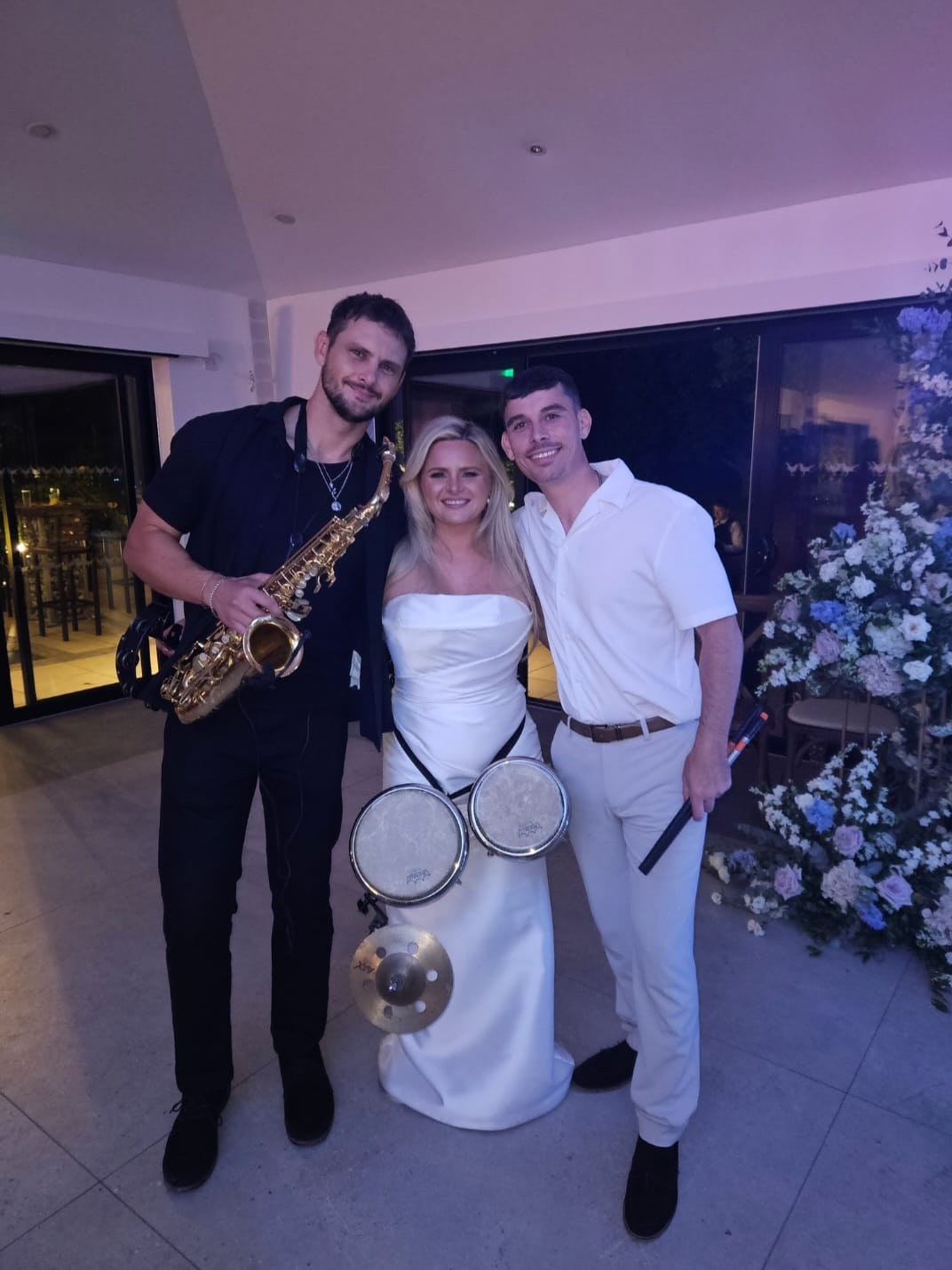 James performing live bongos at an event